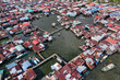 Aerial drone view of traditional fisherman village at Semporna, a city on east coast of Sabah in Malaysia, Tawau District, Borneo island