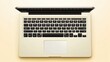 © Johannes - Modern laptop keyboard on yellow background