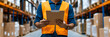 © Quality One   - construction worker in orange vest holds clipboard in warehouse, surrounded by shelves filled with boxes, focusing on inventory management