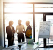 © ClearConcept/peopleimages.com - Presentation, meeting and group in boardroom, discussion and brainstorming for project, sales and lens flare. Planning, talking and ideas for customer needs, people and analysis of competition