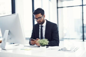 Poster - Businessman, desk and research with phone in office for investment, update or reading economy news. Financial advisor, computer and typing on tech for stocks report, email and review of share price