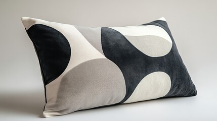 Wall Mural - A rectangular pillow with a black, white and grey geometric pattern.