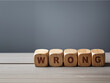 © Ana Baraulia - wood blocks with word Wrong. Wrng decision business and education concept