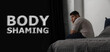 © New Africa - Stop body shaming. Depressed overweight man on bed at home. Banner design
