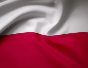 Poland flag waving in the wind. Close up of Poland banner blowing, soft and smooth silk. Cloth fabric texture ensign background. Use it for national day and country occasions concept