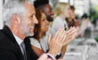 © peopleimages.com - Business, man and people with applause for presentation success, company celebration and achievement. Smile, audience and clapping with meeting victory, good news and promotion results for conference