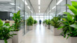 © Chanita - Bright modern office interior with glass walls and abundant green plants, employees moving through a space filled with natural light, eco-friendly workspace.