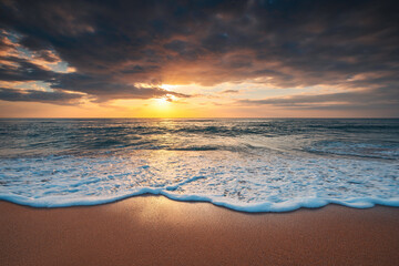 Wall Mural - sea wave close up, low angle view, sunrsie shot