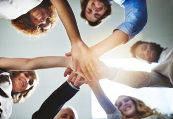 Poster - Partnership, hands together and business people from below in office with unity, team building and collaboration. Meeting, solidarity and group with synergy, motivation and cooperation for company.
