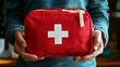 © TensorSpark - Red first aid kit symbolizes readiness for medical emergencies.