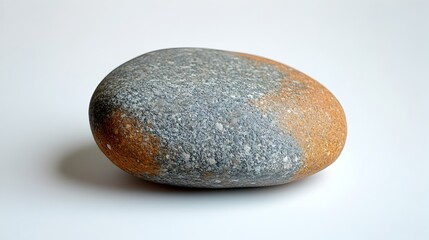 Poster - Smooth gray stone with a natural,textured surface resting on a plain background,creating a minimalist,zen-like atmosphere perfect for decor,meditation,and contemplation.
