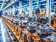 © Wanlop - Tilt-Shift Photography of New Manufactured Car Engines on Automated Production Assembly Line in a State-of-the-Art Car Factory, Showcasing the Efficiency of Modern Automotive Manufacturing