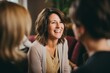 © Vorda Berge - Middle aged female therapist conducting a group session