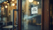 © filmanana - Help wanted sign on cafe door signaling job opportunities