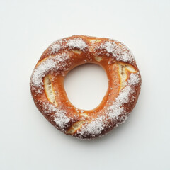 Wall Mural - A soft Bavarian pretzel with salt crystals, isolated on a white background, highlighting a classic snack