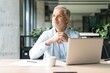 © opolja - Happy mature European business man ceo trader using computer, typing, working in modern office