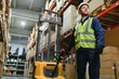 © Serhii - Man Driving Fork Lift Truck In Warehouse
