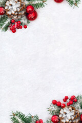 Wall Mural - christmas decoration. cone pine, branches christmas tree, red ball, red berries on snow with space f