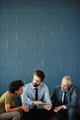 Poster - Meeting, conversation and business people in office, tablet and connection with wall background. Employees, coworkers or group with technology, teamwork or internet for project, idea or sales company