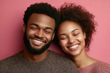 Wall Mural - A joyful couple smiles brightly together against a pastel pink background indoors