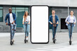 © Prostock-studio - A group of four young adults races on electric scooters through a city environment, exuding joy and camaraderie. They are dressed casually, stand by huge phone with blank screen