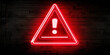 © Andres Mejia - Red neon warning sign glowing on dark wooden wall