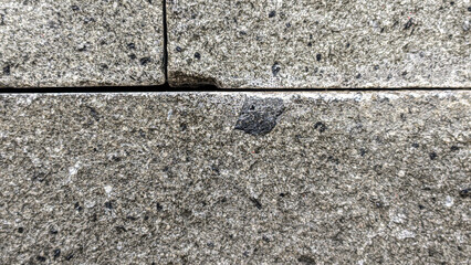 Aufkleber - Stacked natural stone wall. Stone cladding wall made of natural gray stone slabs stacked in rows. Panels for exterior. Decorative slate wall surface pattern.