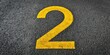 © Watcharapon - Stenciled yellow number 2 on blacktop in parking lot, stencil, number two, yellow paint, pavement, parking lot, background