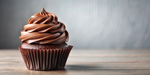 Wall Mural - Delicious chocolate cupcake with swirled frosting on a plain background , cupcake, chocolate, dessert, sweet, bakery, treat, delicious