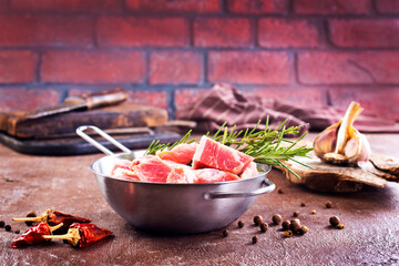 Canvas Print - raw meat with spice in pan