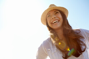 Woman, outdoor laughing and blue sky for freedom, happy tourist and mockup space in Florence. Female person, funny joke and humor on adventure in nature, weekend trip and relax for peace on holiday