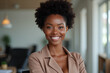© Amir Bajric - beautiful smiling black woman in the office