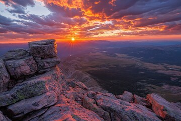 Wall Mural - Sunrise over a mountain range. Perfect for travel, nature, and adventure projects.