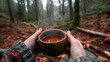 © Sirapopmillion - Serenity in Nature with a Warm Cup of Tea