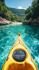 Poster - A vibrant yellow kayak glides through crystal-clear waters in a hidden cove, bordered by rich greenery and rocky formations under a bright blue sky