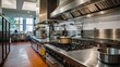 © Robiul - A large commercial kitchen with stainless steel countertop