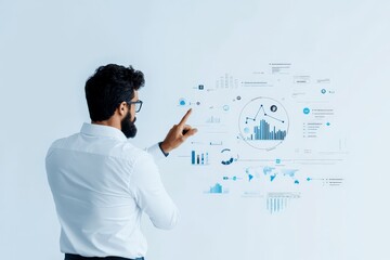 Poster - A man in a white shirt engages with an advanced digital data screen, exemplifying high-tech interaction and analytical insights in a cutting-edge technological environment.