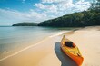 © Anton - Orange kayak on sandy beach with forest and sea