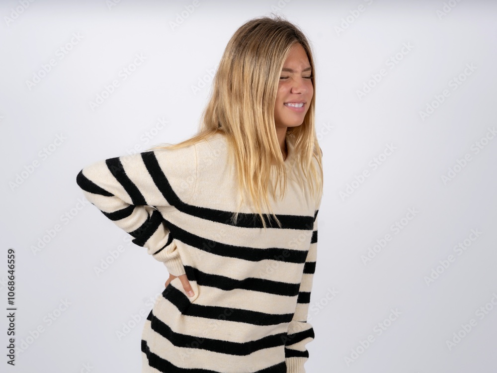 caucasian teen girl wearing striped knitted sweater over white ...