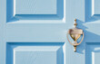 © Tetra Images - USA, New Jersey, Mendham, Close-up of blue front door with brass door knocker