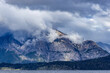 © Tetra Images - Low clouds covering rugged shoreline of Lake Nahuel Huapi