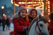 © Yuliia - Happy and smiling children riding carousel on winter evening, against Christmas lights background. Christmas and cozy atmosphere. Happy New Year. Merry Christmas.