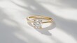 © CreativeBro - A solitary yellow gold diamond engagement ring is presented on a clean white background