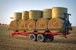 © ankihoglund - Trailer stacked with bales of hay at agricultural field