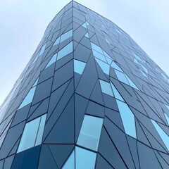 Poster - Modern building with geometric glass facade.