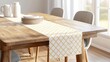 © Adisak - Stylish dining table with decorative runner and tableware, bright natural lighting.