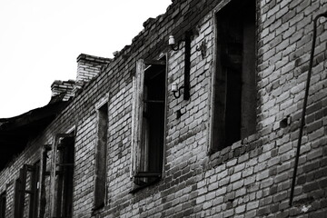 Poster - Old brick building architecture, perfect for urban or historic scenes.