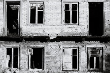 Poster - A classic black and white image of an old abandoned building with intricate details.