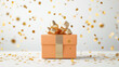 © Attaphol - Brightly wrapped New Year gift box, golden confetti scattered, elegant white background, soft focus, high-detail