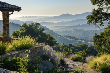 Aufkleber - Breathtaking view of rolling hills and mountains at dawn from a garden patio with blooming plants and soft morning light in a serene countryside setting